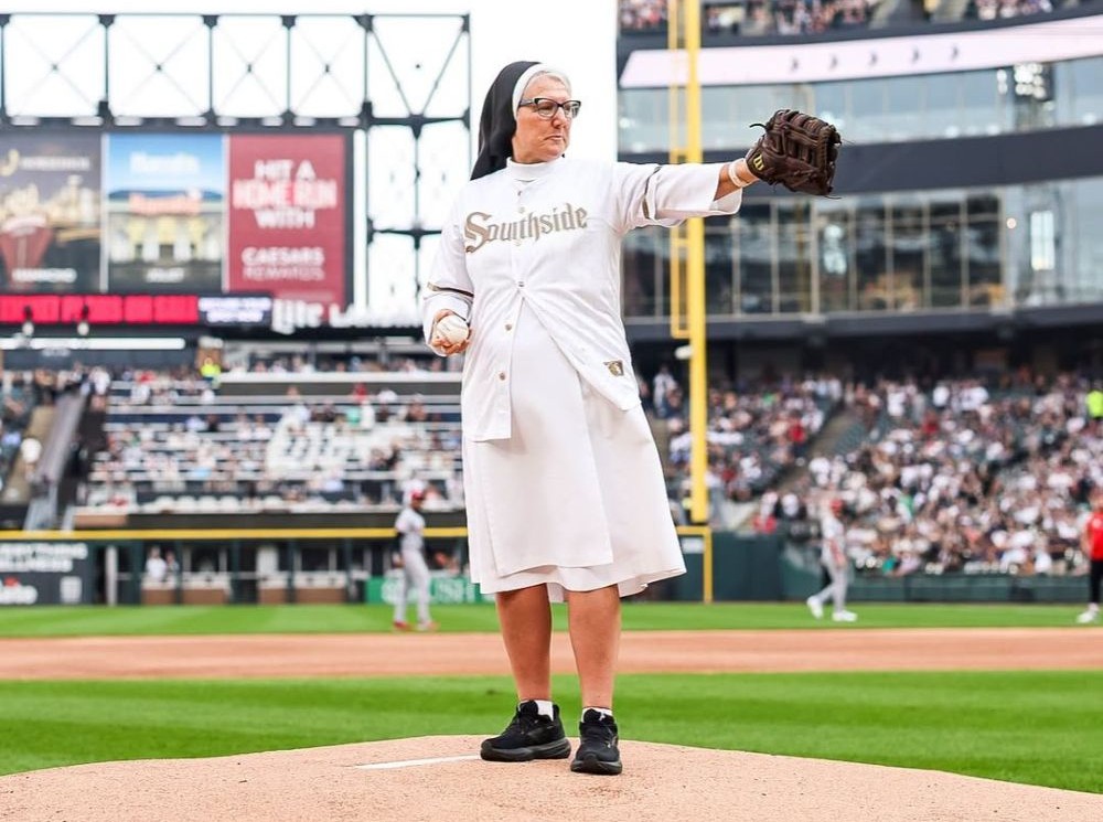 Sr. Mary Jo Sobieck, in an image shared on social media by the Chicago White Sox, takes aim before throwing the ceremonial first pitch at the White Sox game Aug. 11. (Courtesy of the Chicago White Sox)