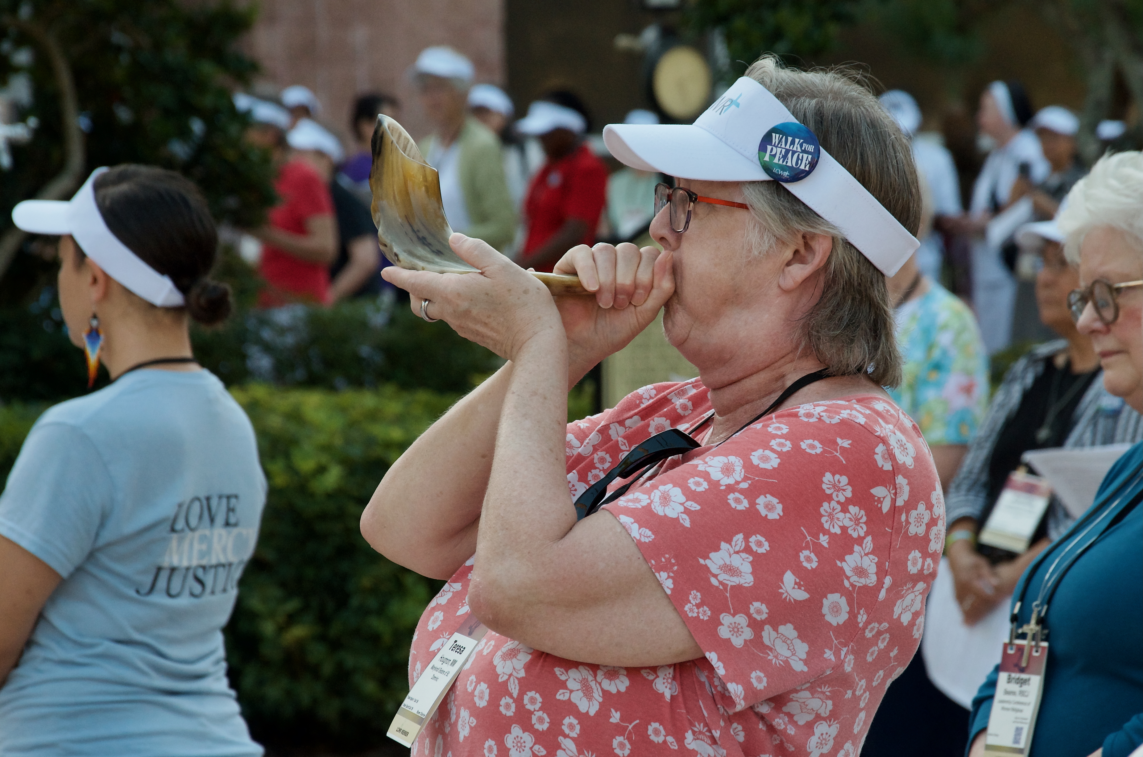 Sister blowing horn