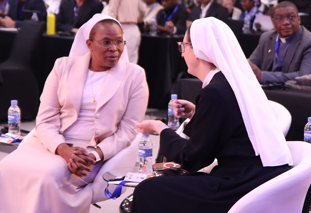 Sr. Nina Krapić, deputy director of the Holy See Press Office, right, speaks to Sr. Jane Wakahiu, associate vice president of the Catholic Sisters Initiative at the Conrad N. Hilton Foundation. Both were speakers at the SIGNIS World Congress in Kigali, Rwanda, Aug. 1-8, 2026. (Courtesy of Sr. Rocio Garcia)