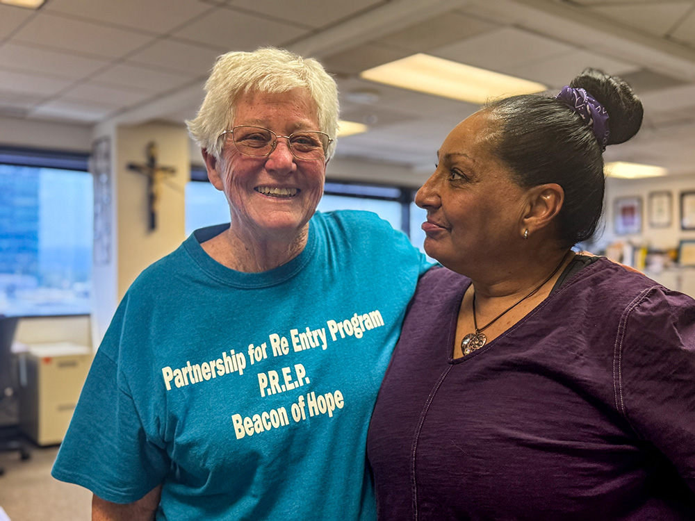 Dominican Sr. Mary Sean Hodges talks with Sylvia Trevino at the offices of the Partnership for Re-Entry Program June 8, 2026, in Los Angeles. (GSR photo/Rhina Guidos)