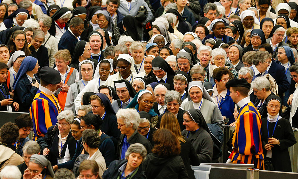 The heads of women's religious orders leave an audience with Pope Francis in Paul VI hall at the Vatican May 12, 2016. During that session with members of the International Union of Superiors General, sisters asked Francis about the possibility of women deacons returning to the church. (CNS/Paul Haring)
