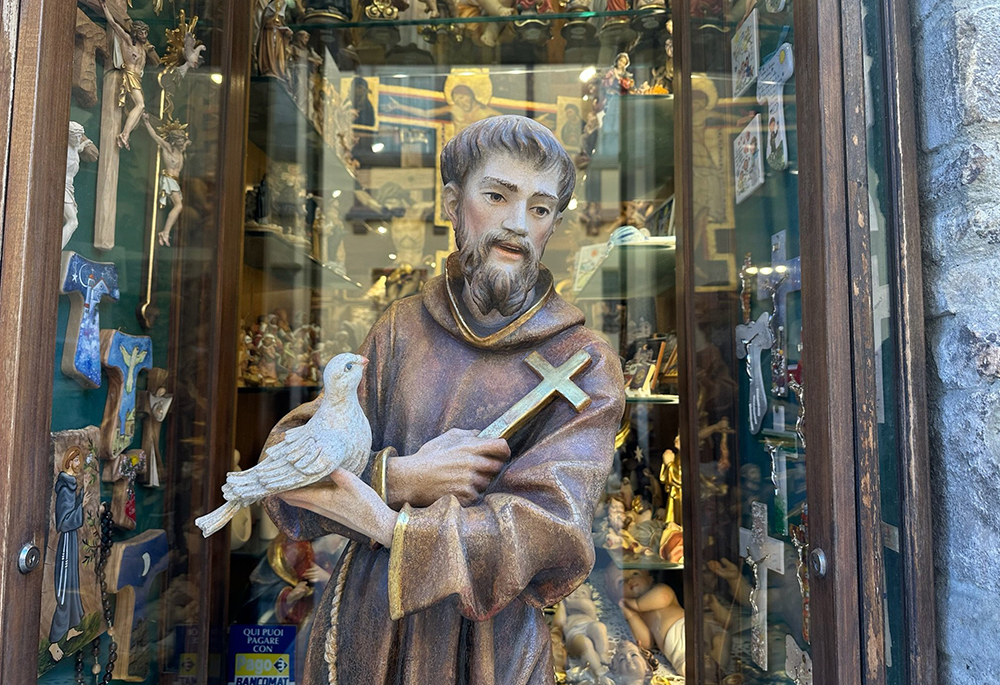 A statue of St. Francis is seen in a storefront along a street in Assisi, Italy, Feb. 22, 2026. (OSV News/Courtney Mares)