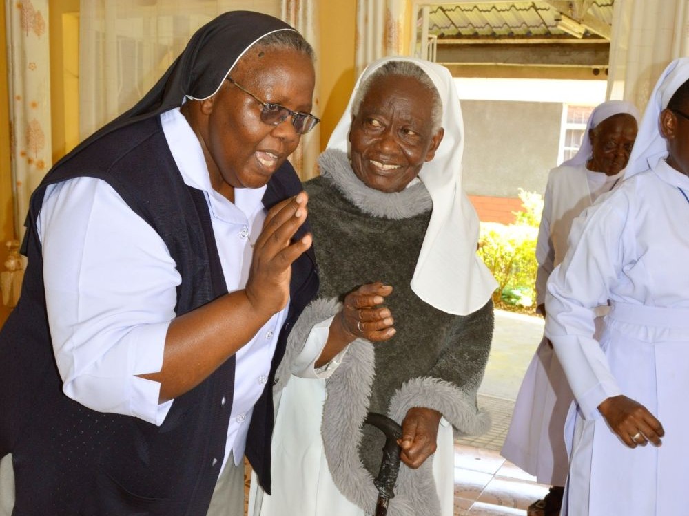 Sr. Agnes Wamuyu, the executive director of the Care for Aging Sisters Association Kenya, shares a moment with Sr. Albina Mwangale of the Sisters of Mary of Kakamega during the Conrad N. Hilton Foundation's senior staff site visit in June 2026. (Courtesy of Sr. Agnes Wamuyu)