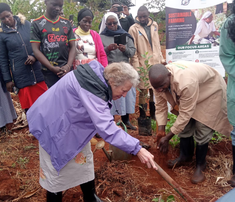 Presentation Sr. Joyce Meyer, international liaison to women religious for GSR and board member of the Conrad N. Hilton Foundation, plants a tree at a community farming project outside Mombasa, Kenya. (Hilton Foundation)