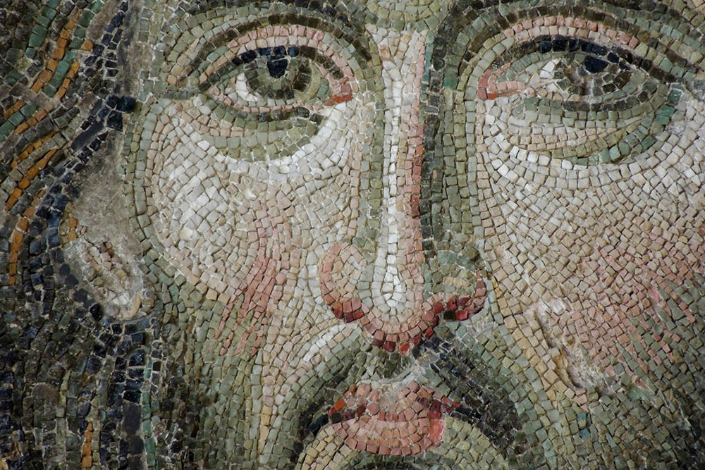 Closeup of a mosaic of Jesus' face (Unsplash/Nick Kwan)