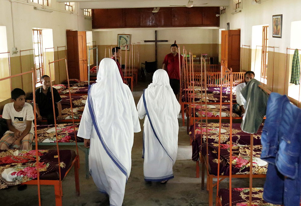 Sister Natali and Sister Bandita inspect the patients' rooms at Mary's House of Love, an 80-bed facility that prioritizes the local Indigenous Garo population. (Stephan Uttom Rozario)