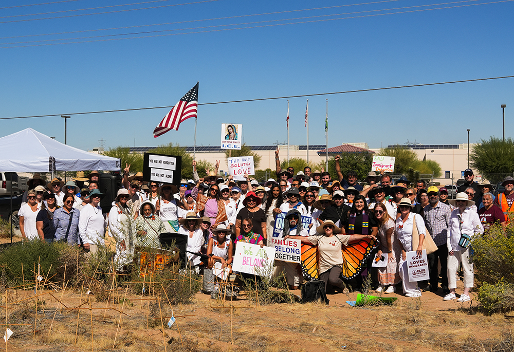 Activists pose for a photo after a prayer vigil outside an ICE detention center Oct. 7 in Adelanto, California. The vigil was held to pray for immigrants detained there and to draw attention to alleged inhumane conditions inside the facility. (Courtesy of Sisters of St. Joseph of Orange)