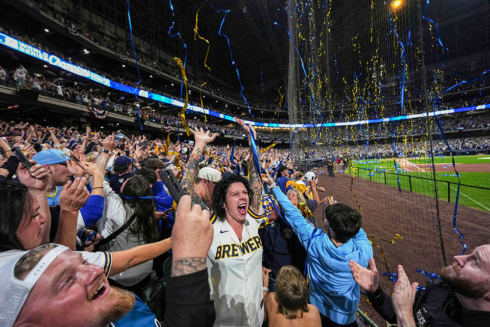 Fans cheer during a watch party at American Family Field after the Milwaukee Brewers defeated the Tampa Bay Rays in Game 5 of baseball's World Series, Wednesday, Oct. 28, 2026, in Milwaukee. (AP/Ross Harried)