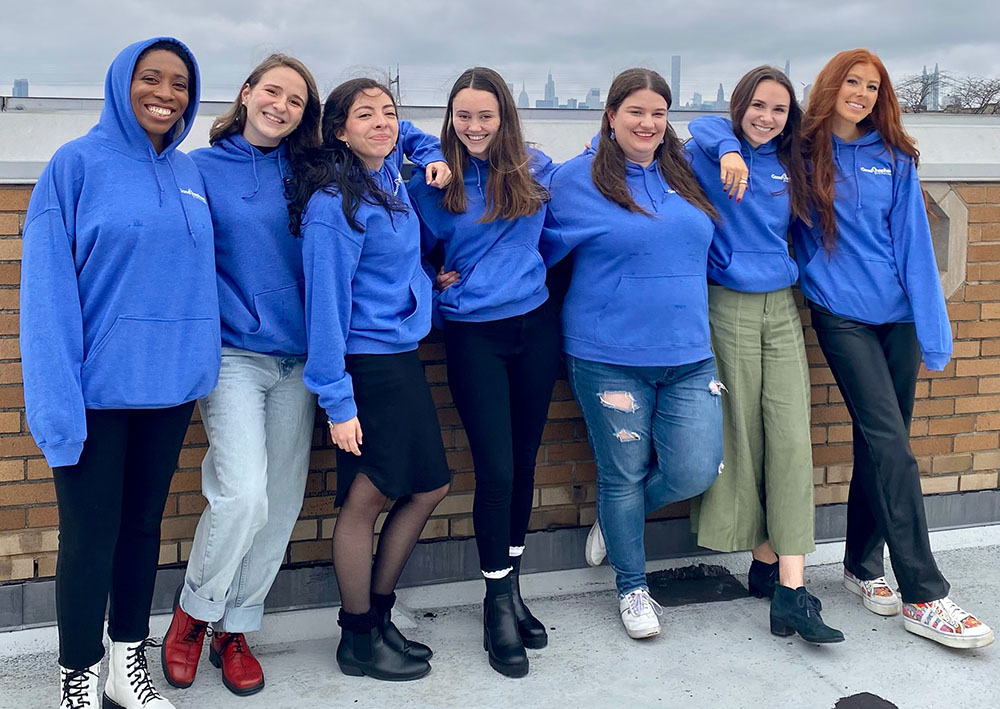 All the Good Shepherd Volunteers received sweatshirts at our holiday party. From left: Moe Berry, Gabby Kasper, Maria Jose Miranda, Mackenzie Moore, Erin Hood, Theresa Vaske and Caileigh Pattisall. (Courtesy of Michelle DeMello)