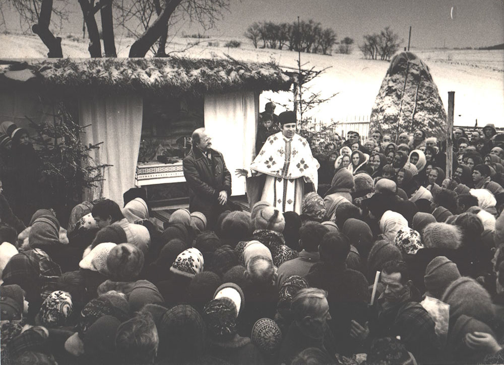 A liturgy of the Ukrainian Greek Catholic Church, held outside in the village Tserkivna, Ivano-Frankivsk region, Ukraine, 1989 (Courtesy of Basilian Sisters' museum, Osijek, Croatia)