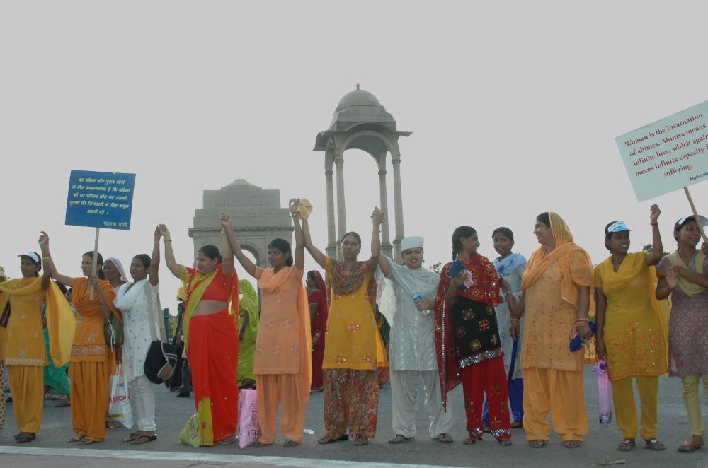 Women stand at India Gate in New Delhi, India, at the launch of a national campaign on the prevention of violence against women Oct. 2, 2009. (Wikimedia Commons/Ministry of Women and Child Development, Government of India)