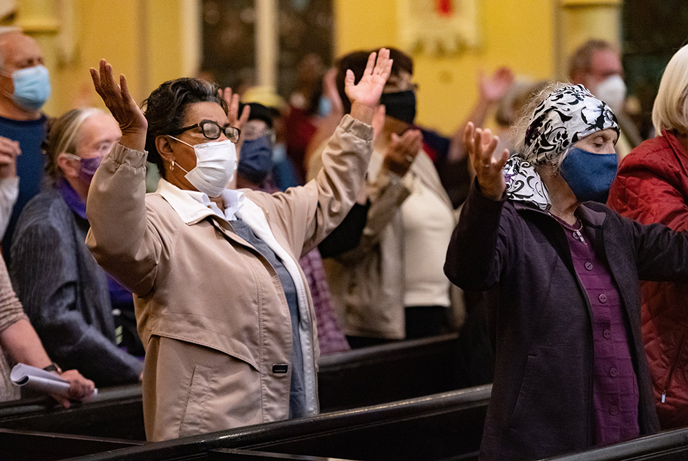 People in Baltimore attend All Saints' Day Mass at St. Ann Church Nov. 1. (CNS/Catholic Review/Kevin J. Parks)