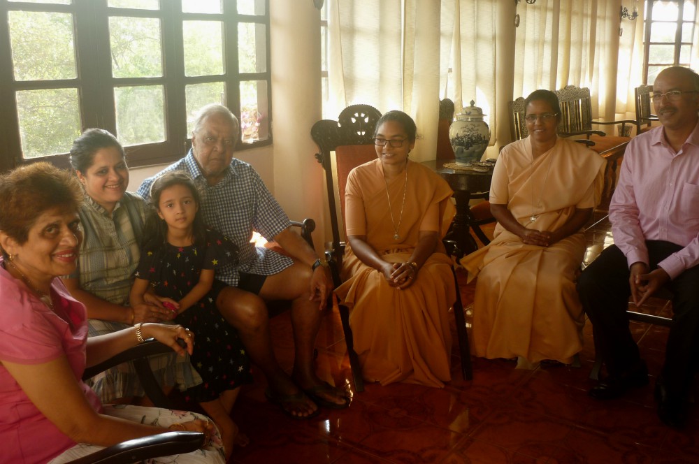 Sr. Jyothi Kerketta and Sr. Celine Sebastian of the Daughters of St. Paul converse with a family in the Fontainhas neighborhood of Panjim India. (Lissy Maruthanakuzhy) Sr. Jyothi Kerketta and Sr. Celine Sebastian of the Daughters of St. Paul converse with a family in the Fontainhas neighborhood of Panjim India. (Lissy Maruthanakuzhy)