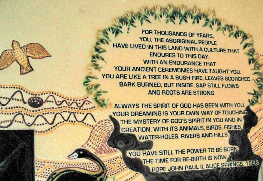 A highlight of my time in Redfern, Australia, was the communal painting of a mural in St. Vincent's Parish Church, with words from a speech made by Pope John Paul II at Alice Springs in 1986. (Courtesy of Esmey Herscovitch)