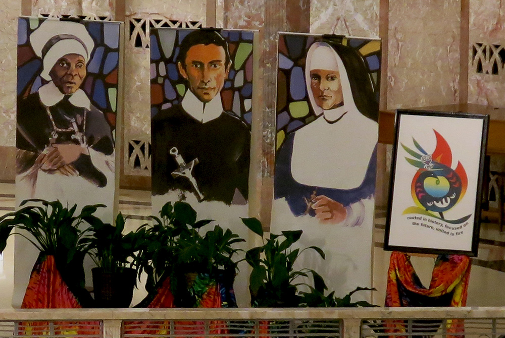 IHM founders display Banners portraying Mother Mary Lange, founder of the Oblate Sisters of Providence, Redemptorist Fr. Louis Gillet and Mother Theresa Maxis Duchemin, founders of the Sisters, Servants of the Immaculate Heart of Mary (IHM Communication Office of Monroe)