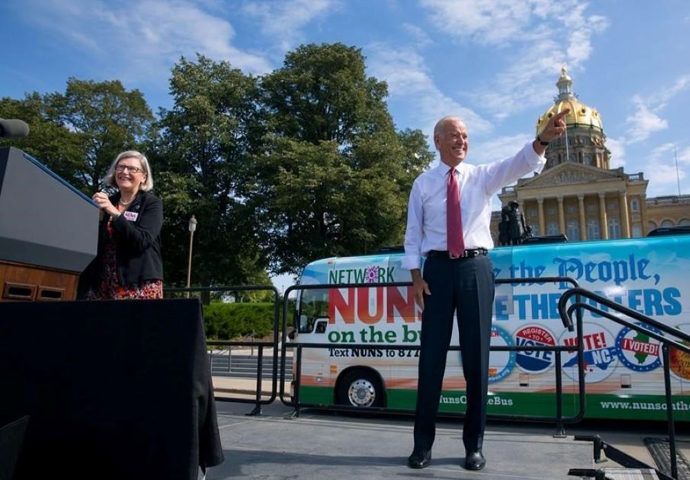 Social Service Sr. Simone Campbell, left, and Joe Biden at a Nuns on the Bus event in Iowa in 2014, when Biden was vice president (Courtesy of Network Lobby for Catholic Social Justice)