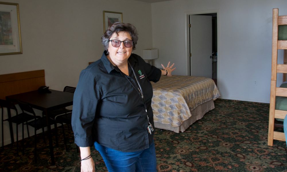 Presentation Sr. Julie Marsh shows the layout of one of the rooms at Hotel Hope, a shelter for women and children experiencing homelessness in New Orleans. (GSR photo/Dan Stockman)