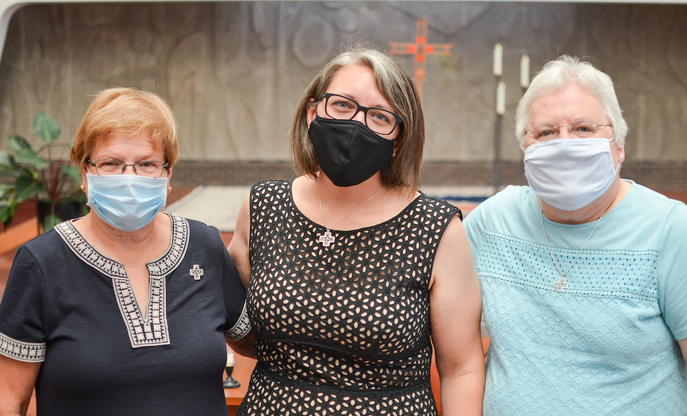 Congregation of St. Joseph sisters together for the first vows of Sr. Sarah Simmons, center, Aug. 15, 2020: Sr. Kathy Brazda, left, and Sr. Sallie Latkovich, right (Provided photo)