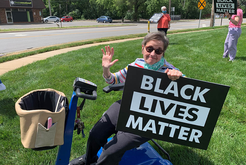 Sister Karen Jean Zielinski protests for Black Lives Matter in her motorized chair. (Courtesy of Sylvania Ohio Franciscans) Sister Karen Jean Zielinski protests for Black Lives Matter in her motorized chair. (Courtesy of Sylvania Ohio Franciscans)