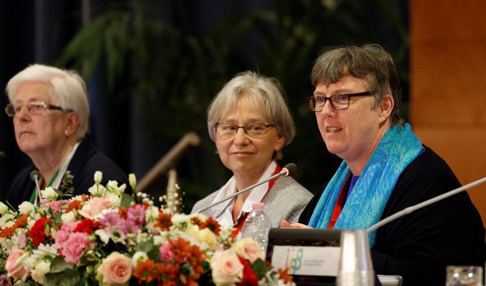 Sr. Mary Teresa Barron, right, superior general of the Sisters of Our Lady of Apostles, speaks May 3 at the UISG assembly in Rome with Loreto Sr. Patricia Murray, left, UISG executive secretary, and Claretian Sr. Jolanta Kafka. (CNS)