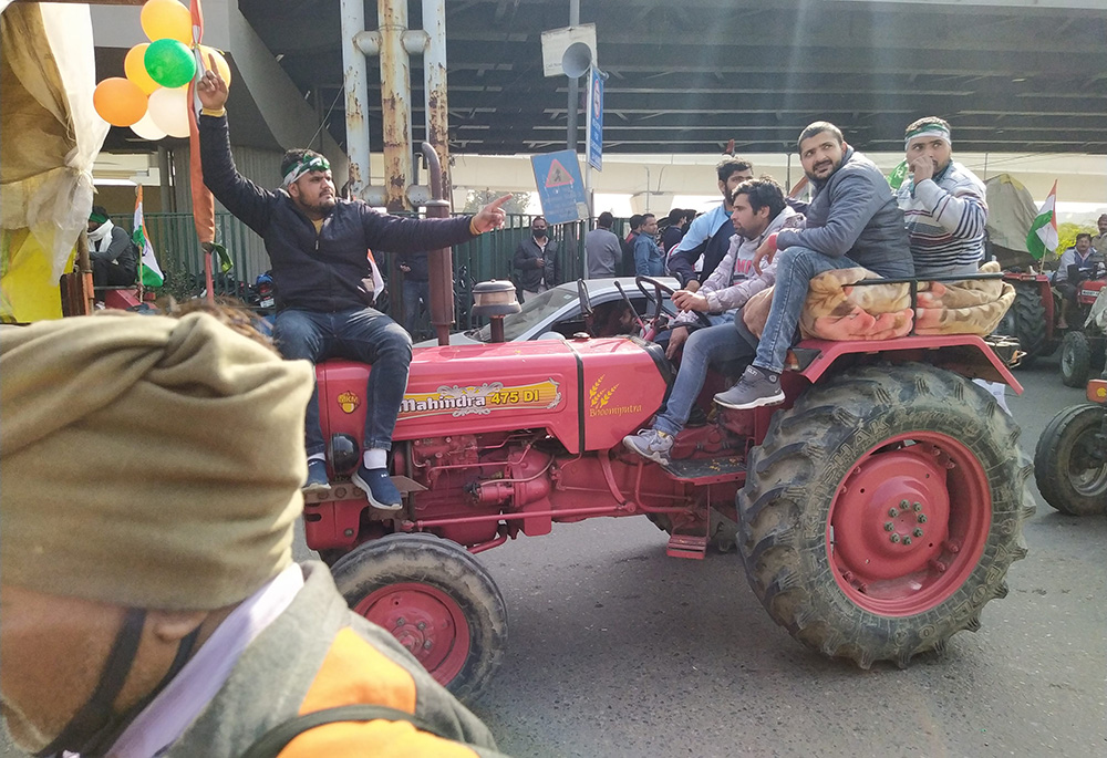 Farmers come to the Indian capital on tractors to protest three controversial farm laws that were later repealed after a year of demonstrations outside Delhi. (Jessy Joseph) Farmers come to the Indian capital on tractors to protest three controversial farm laws that were later repealed after a year of demonstrations outside Delhi. (Jessy Joseph)