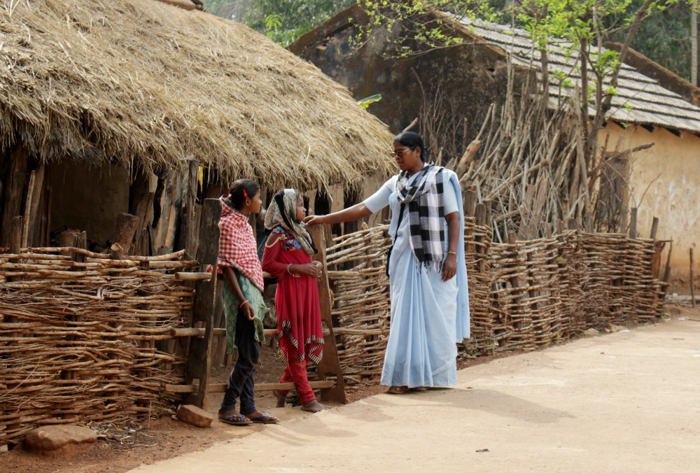 Sister Veronica visits a Ho tribal village. Motivating young girls and boys for education and employment is one of our main tasks in bringing about societal development. (Tessy Jacob) Sister Veronica visits a Ho tribal village. Motivating young girls and boys for education and employment is one of our main tasks in bringing about societal development. (Tessy Jacob)