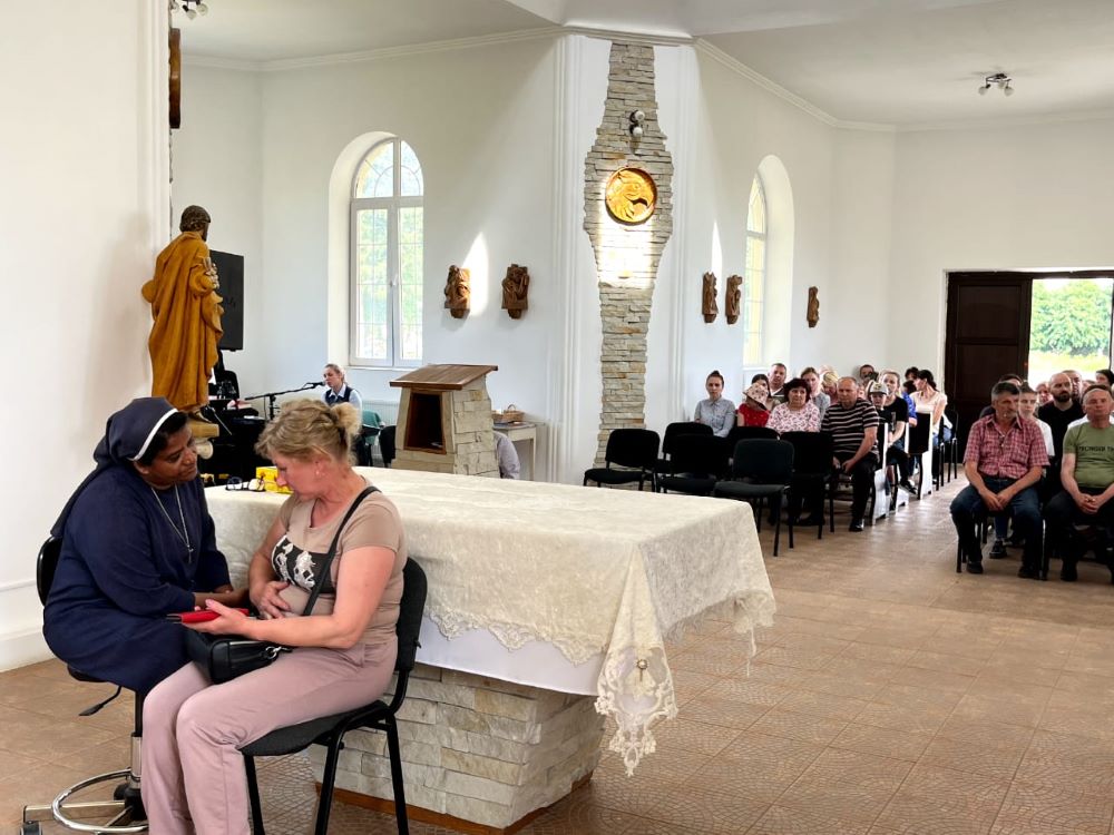 Sr. Ligi Payyappilly consoles a participant during the therapy sessions at St. Joseph of Saint-Marc Convent in Mukachevo, Ukraine. (Courtesy of Ligi Payyappilly)