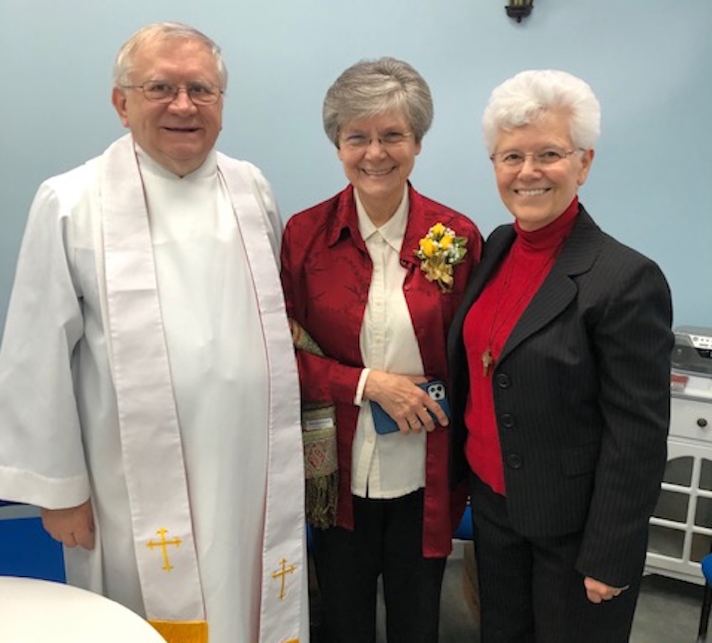 Sr. Carole Riley, right, a member of the Sisters of Divine Providence who directs the West Virginia Institute for Spirituality, stands with Ursuline Sr. Cheryl Clemons, center, and the institute's chaplain, Fr. Bill Petro, Jan. 6, 2020. (Provided photo) Fr. Bill Petro, Sr. Carole Riley, Sr. Cheryl Clemons standing together