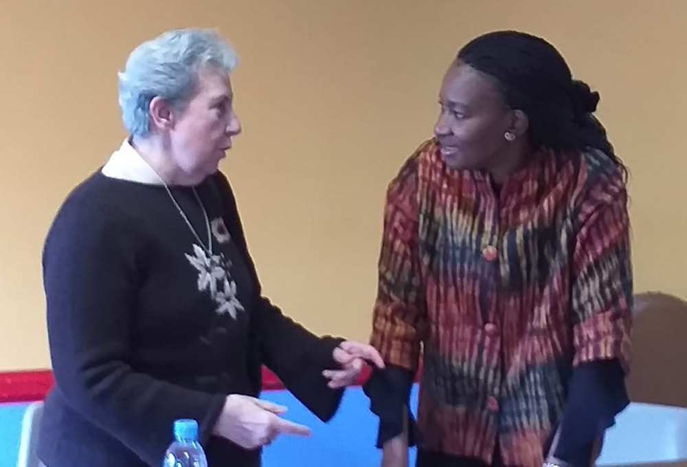 Sr. Begoña Iñarra with Nicole Ndongala, director of Karibu, at the association's general assembly in 2019 (Courtesy of Begoña Iñarra)