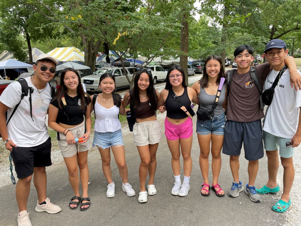 A group of Nghia Si or high schoolers of the Vietnamese Eucharistic Youth Movement from Kansas City, Lincoln and Austin hangs out during Marian Days. (Peter Tran)