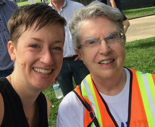 Brittany Koteles, left, co-director of Nuns and Nones, takes a selfie with Immaculate Heart of Mary Sr. Joan Mumaw at a 2019 demonstration against the treatment of immigrants at the border. "The whole thing was a literal embodiment of sisters helping us f