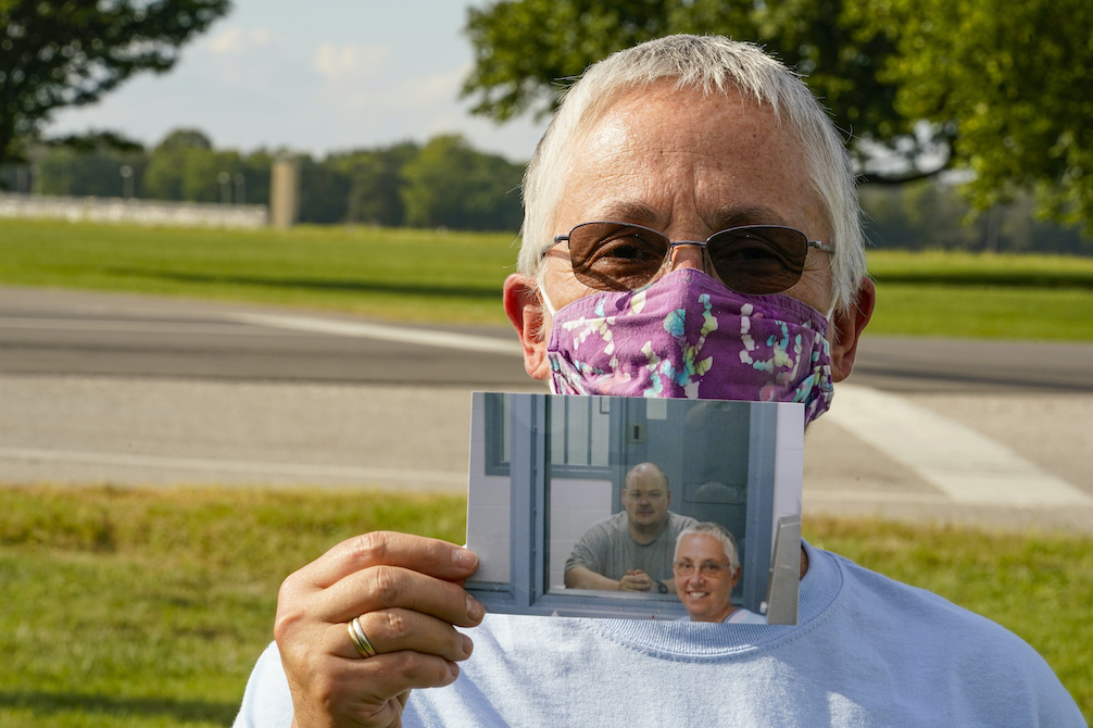 Providence Sr. Barbara Battista holds a photo taken during her last visit with Keith Dwayne Nelson, who was executed at the federal prison complex in Terre Haute, Indiana, Aug. 28, 2020. Battista was Nelson's spiritual adviser. (AP)