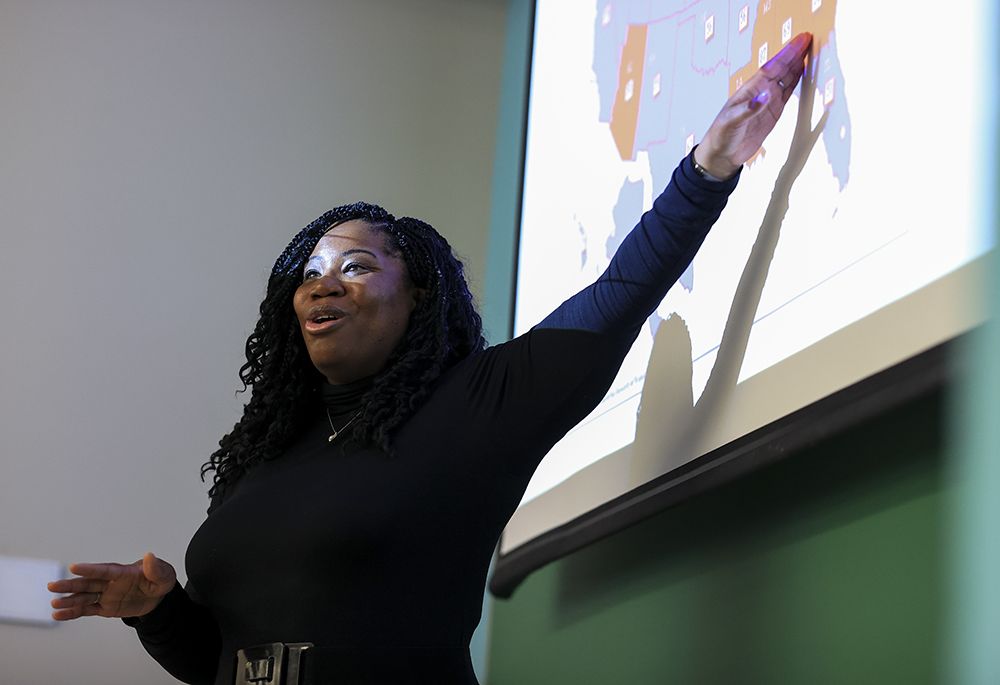 Shannen Dee Williams, associate professor of history at the University of Dayton, speaks to her students during a class April 21 in Dayton, Ohio. (AP photo/Aaron Doster)