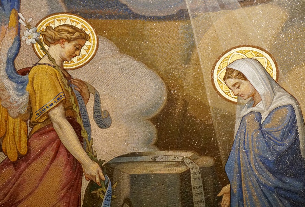 The Annunciation is depicted in an 1896 mosaic by Melchior Doze in the Basilica of Our Lady of the Rosary of Lourdes, France. (Wikimedia Commons/Hammondtravels) The Annunciation is depicted in an 1896 mosaic by Melchior Doze in the Basilica of Our Lady of the Rosary of Lourdes, France. (Wikimedia Commons/Hammondtravels)
