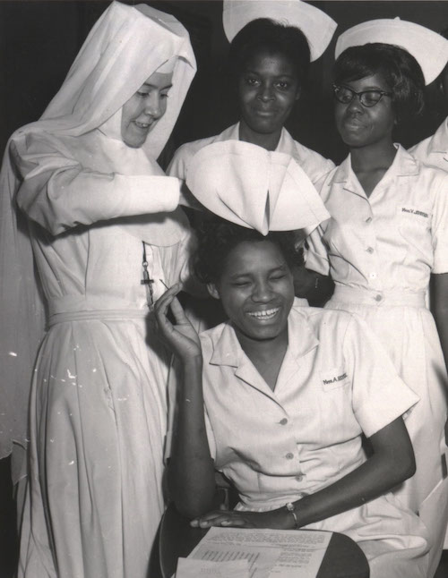 St. Joseph Sr. Barbara Lum, left, at a February 1965 capping ceremony in Selma, Alabama. (Courtesy of the Sisters of St. Joseph of Rochester) 