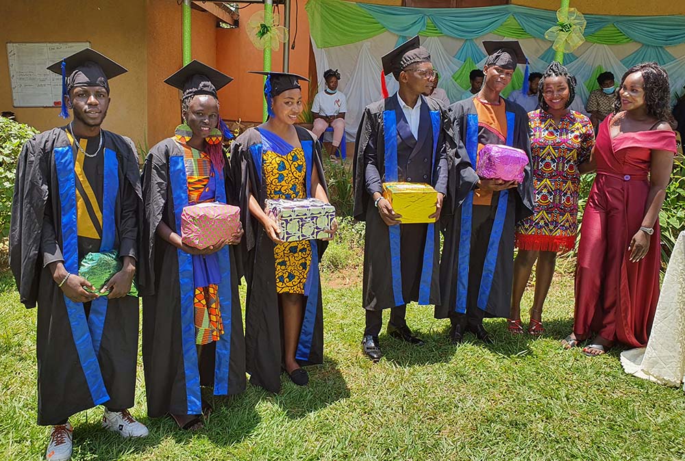 Tailoring students were awarded prizes by Jesuit Refugee Service on graduation day in Kampala, Uganda. (Courtesy of Jesuit Refugee Service)