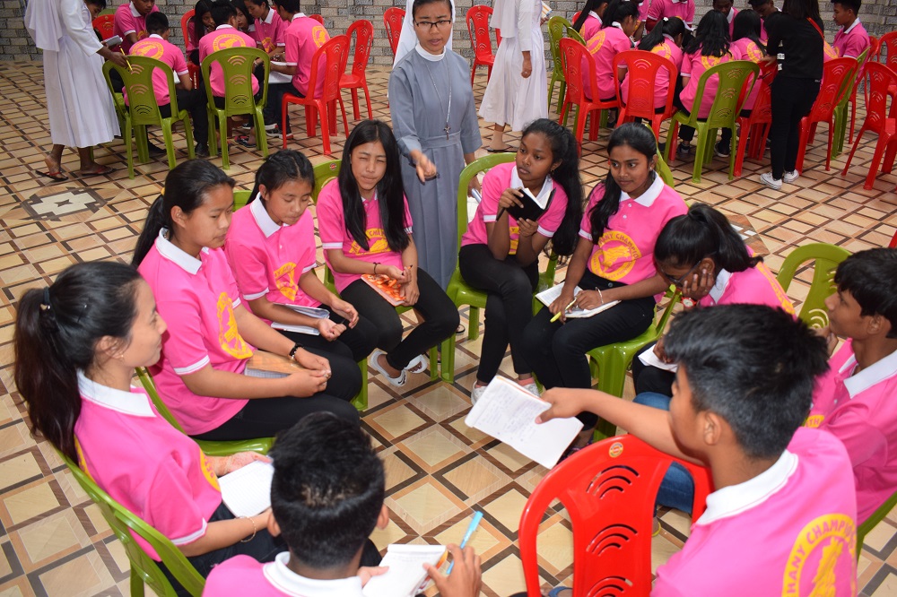 Bethany Champions group discussion Students discuss life goals at an event of the Bethany Champions, a teenage formation program launched by the Bethany Sisters. (Courtesy of the Bethany Sisters)