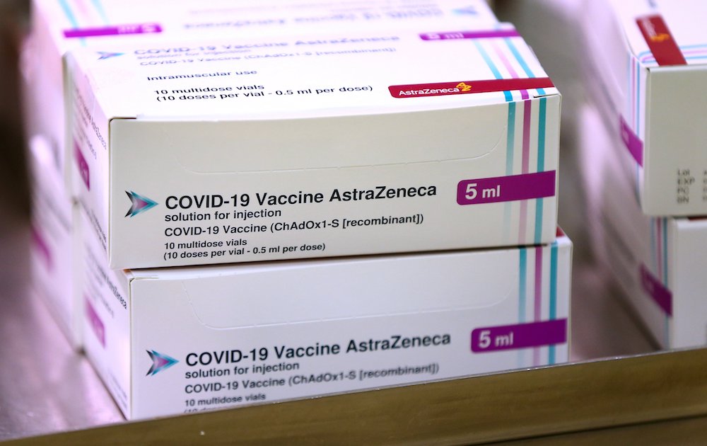 Boxes of the Oxford University/AstraZeneca COVID-19 vaccine are seen at the Princess Royal Hospital in Haywards Heath, England, on Jan. 2. (CNS/Reuters pool/Gareth Fuller)
