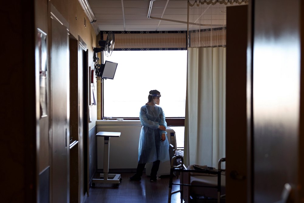 A Walgreens pharmacist prepares the Pfizer-BioNTech coronavirus vaccine at Hamilton Park Nursing and Rehabilitation in the Brooklyn borough of New York City on Jan. 4. (CNS/Reuters/Yuki Iwamura)