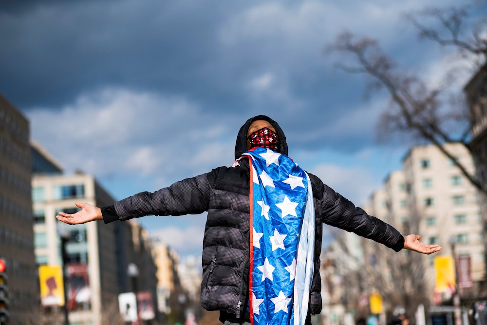 A person celebrates at Black Lives Matter Plaza in Washington, D.C., Jan. 20, 2021. (CNS/Reuters/Eduardo Munoz)