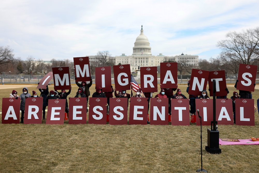 Immigration advocates display a message on the National Mall near the U.S. Capitol in Washington Feb. 17, 2021. (CNS/Reuters/Tom Brenner)