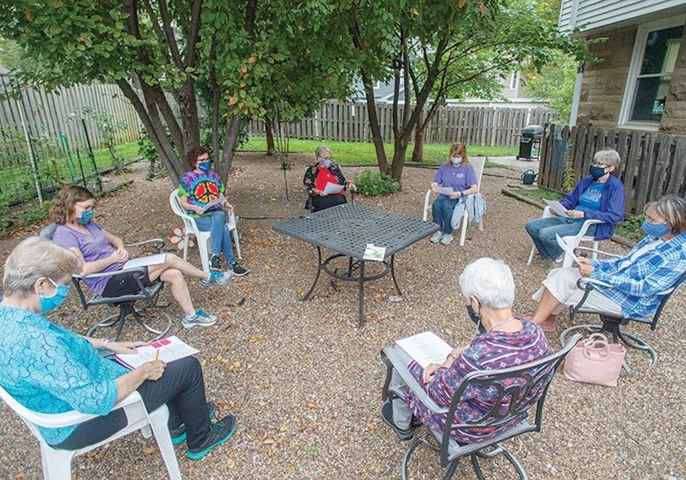 A woman's prayer group offered by Srs. Mary Barbara Wieseler and Elena Mack meets in the backyard of a Sisters of Charity of Leavenworth house in Kansas City, Kansas, during the pandemic. (Sisters of Charity of Leavenworth)