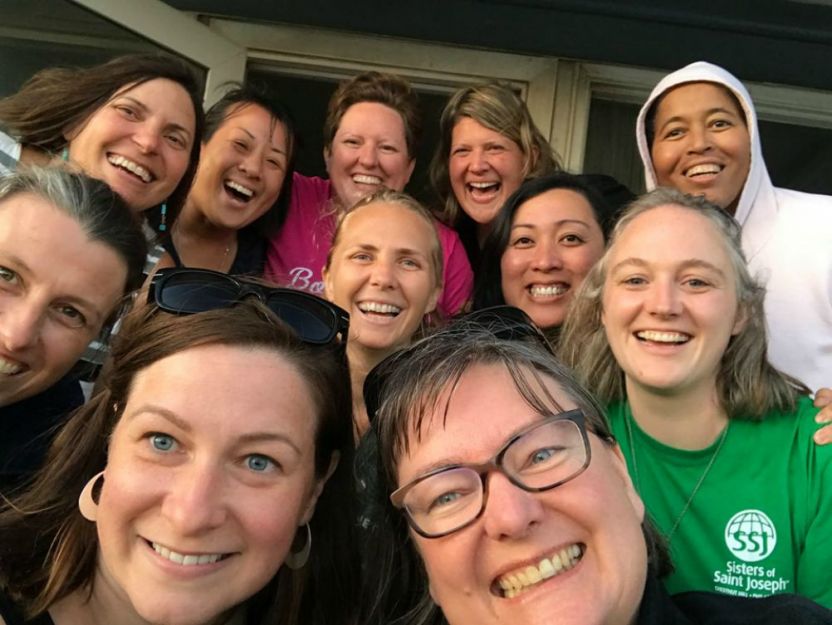 Sr. Colleen Gibson, right, in green, with other Sisters of St. Joseph.