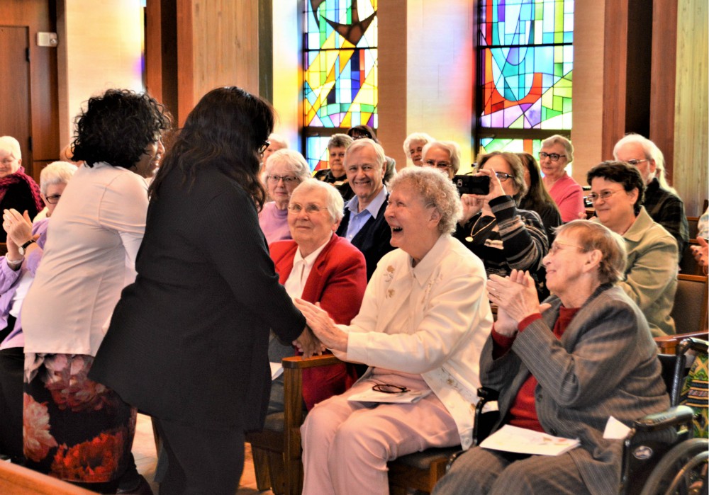 Civic and community leaders of Erie, Pennsylvania, and many friends and associates celebrate three social justice icons, Mercy Sr. Rita Brocke, St. Joseph Sr. Mary Claire Kennedy and Benedictine Sr. Marlene Bertke, at a 2019 Catholic Sisters Week event.