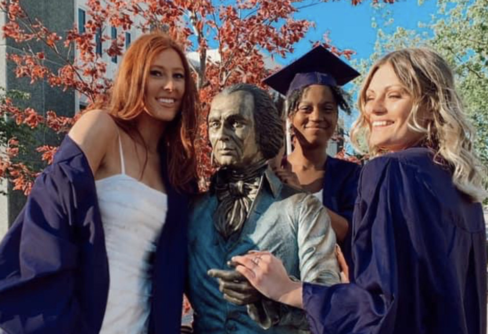 While the class of 2020 didn't get a proper graduation, my roommates and I had a great time celebrating our graduation in quarantine. This is a photo with my roommates and James Madison University's statue of James Madison. (Courtesy of Caileigh Pattisall