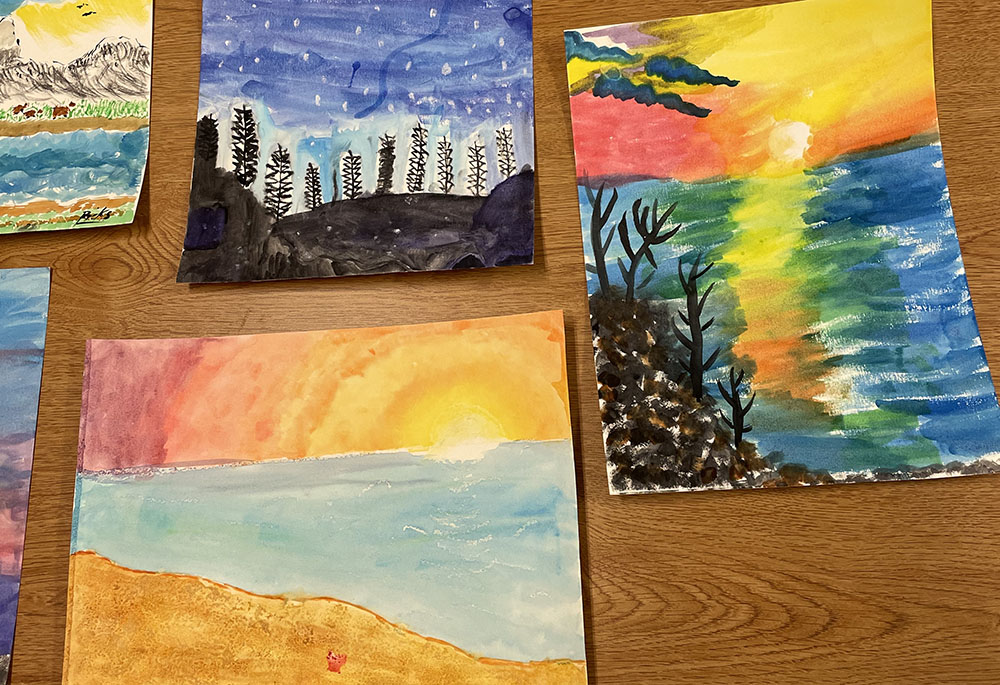 In one art therapy group, we explored painting with watercolor. I wanted the boys to explore landscapes and visualize where they feel calm. (Caileigh Pattisall)