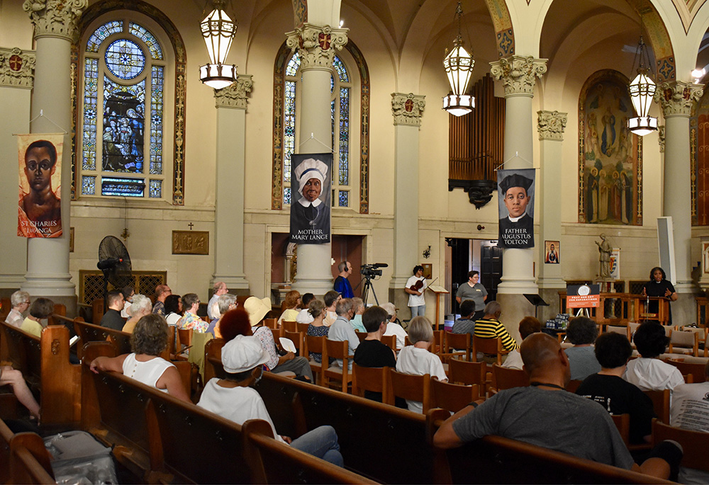 Network Lobby and the Cleveland Network Advocates Team host "Repair and Redress: A Vigil for Reparations" at St. Aloysius-St. Agatha Parish June 15 in Cleveland's Glenville neighborhood. (Network Lobby/Catherine Gillette)