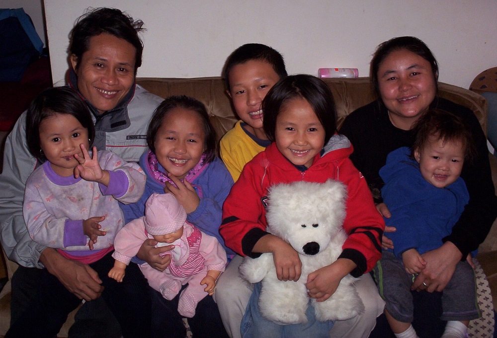 The Burmese family mentored by Sr. Margaret Cessna after a visit to the health clinic. (Courtesy of Margaret Cessna)