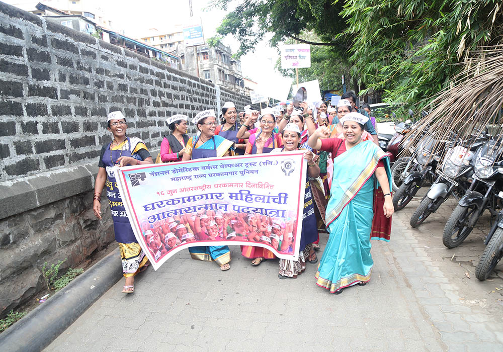 Sr. Christin Mary (front row, right), a member of the Missionary Sisters of the Immaculate Heart of Mary and a coordinator of the National Domestic Workers' Movement, leads a march of domestic workers in Mumbai in June 2017. (Provided photo) Sr. Christin Mary (front row, right), a member of the Missionary Sisters of the Immaculate Heart of Mary and a coordinator of the National Domestic Workers' Movement, leads a march of domestic workers in Mumbai in June 2017. (Provided photo)
