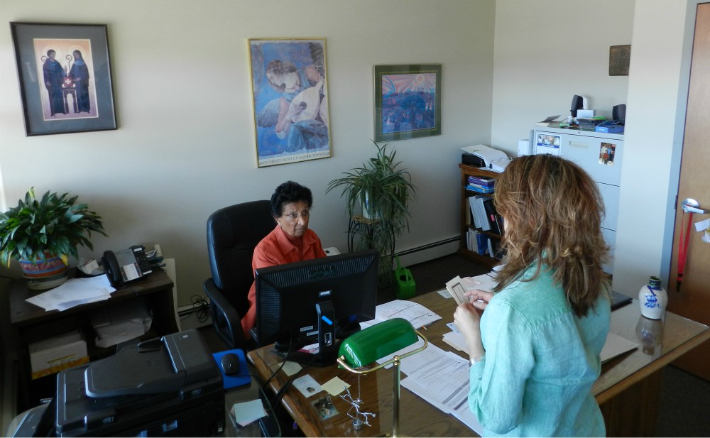 Chicago Benedictine Sr. Karen Bland, left, in her office at Grand Valley Catholic Outreach in Grand Junction, Colorado, where she is executive director (Courtesy of the Benedictine Sisters of Chicago) Chicago Benedictine Sr. Karen Bland, left, in her office at Grand Valley Catholic Outreach in Grand Junction, Colorado, where she is executive director (Courtesy of the Benedictine Sisters of Chicago)